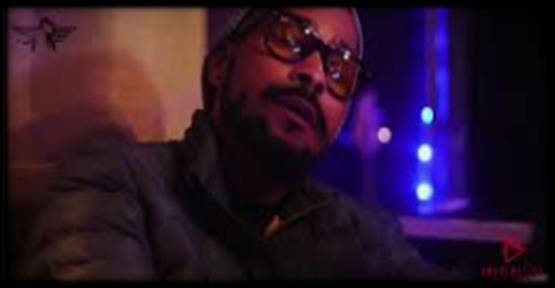 Aaron Skyy in the studio under purple light