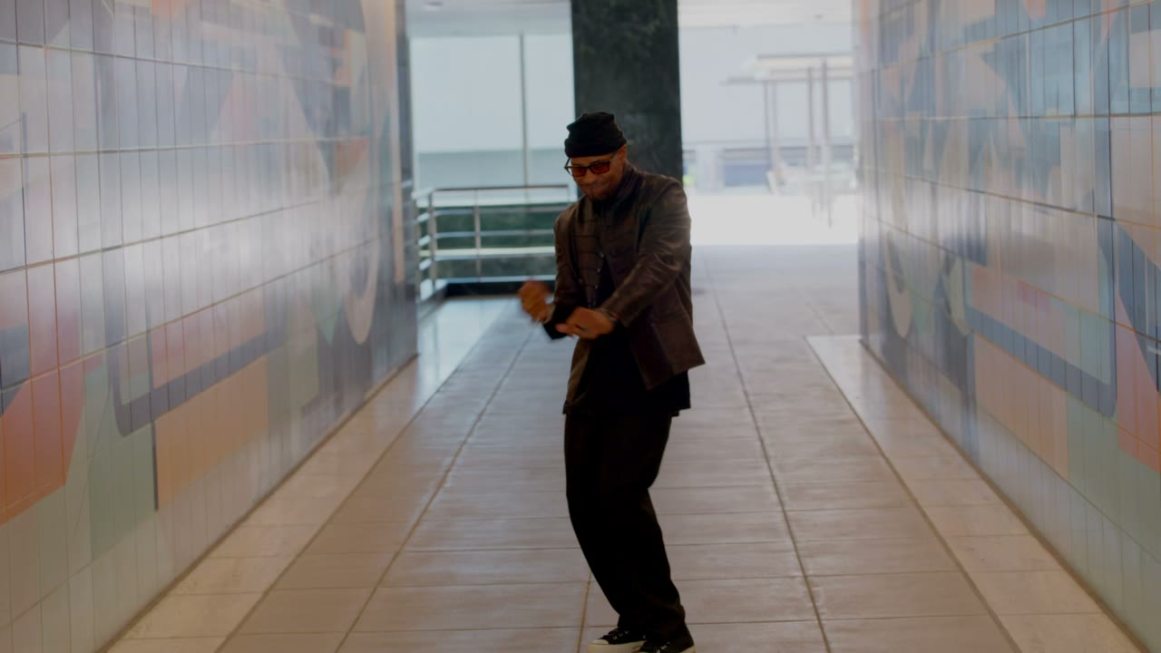 Aaron Skyy dancing down a tiled hallway in the Way We R teaser